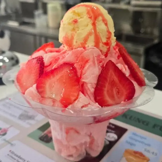 Strawberry snow ice dessert topped with ice cream at Kung Fu Tea, a Milk Tea Shop in Huntington