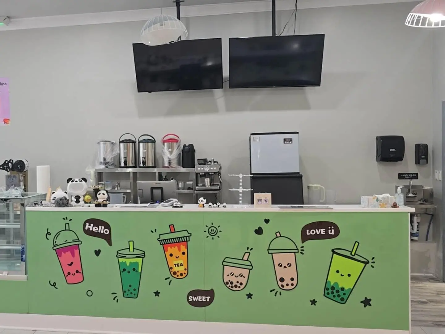 Kung-Fu-Tea-Milk-Tea-Shop-Cute-Themed-Counter-Decor-Huntington Counter at Kung Fu Tea decorated with cute bubble tea illustrations at Kung Fu Tea, a Milk Tea Shop in Huntington